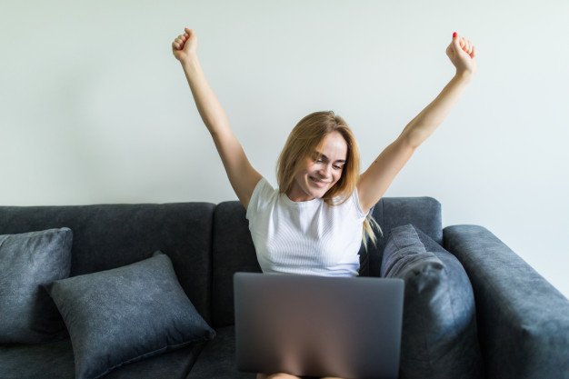 Woman Sitting on Sofa in Condo in Manila